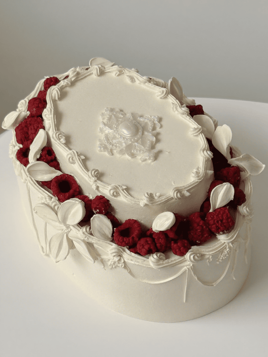 Classic Berry Cake – Vintage Oval Cream Cake with Raspberries