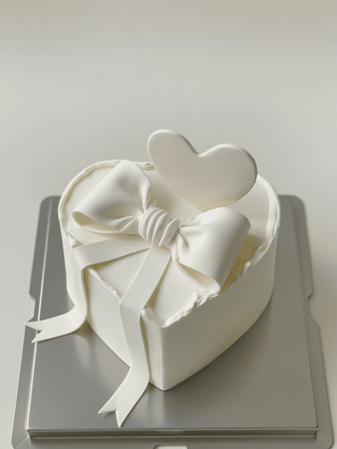 Minimalist White Bow Cake