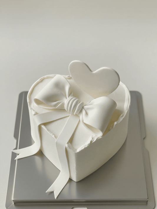 Minimalist White Bow Cake
