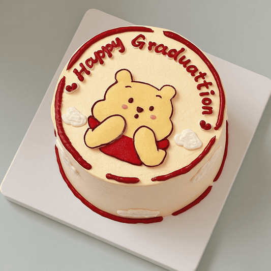 Winnie Bear Graduation Cake