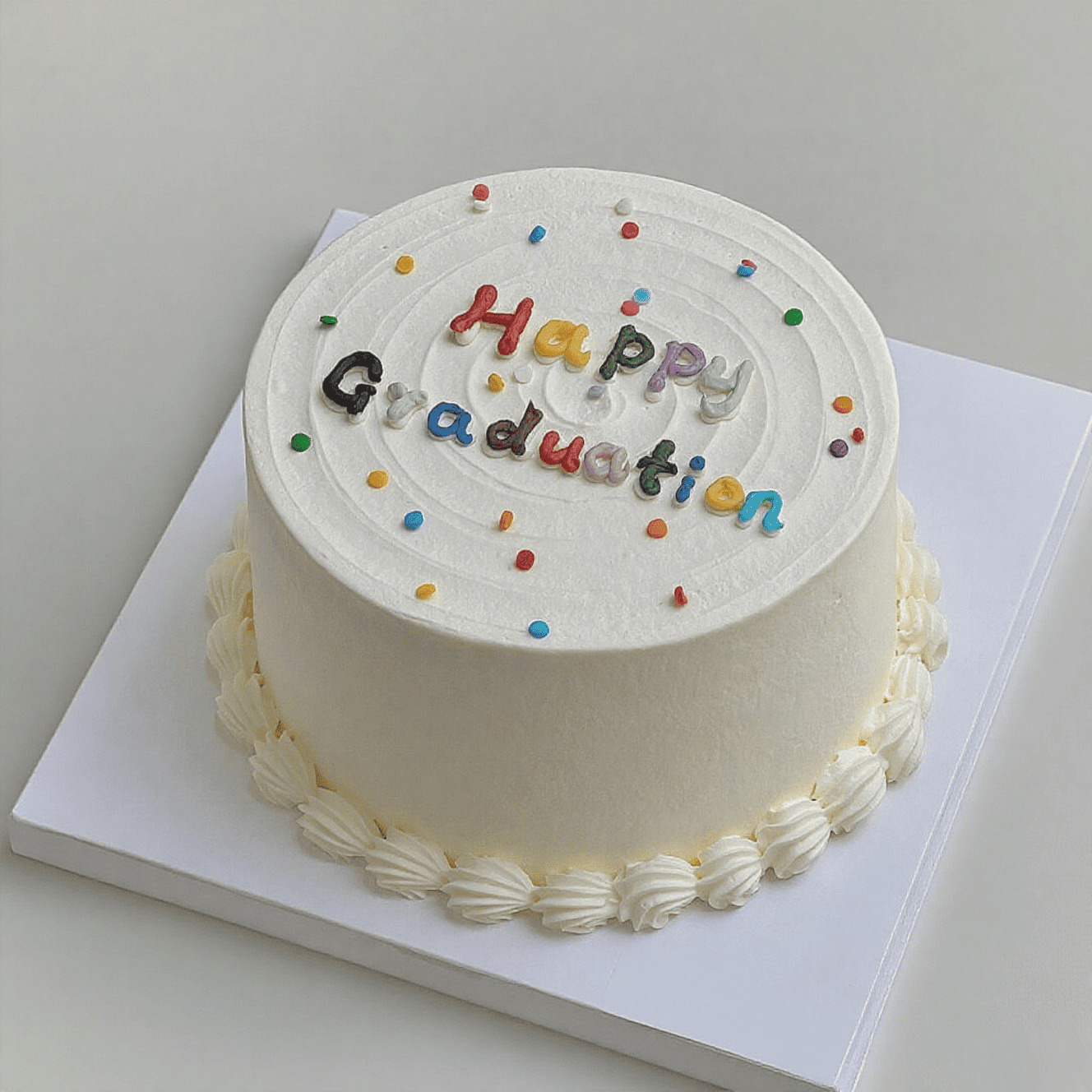 Minimalist Dopamine Graduation Cake