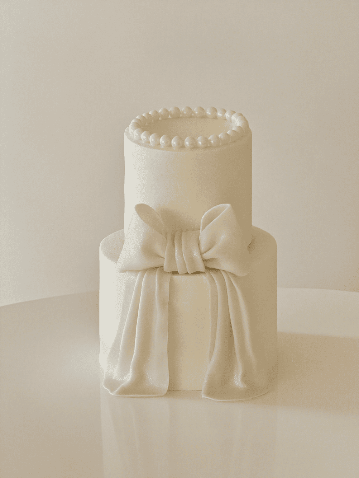 Elegant Pearl Bow Two-Tier Cake
